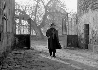 Jean Gabin as Inspector Jules Maigret in MAIGRET AND THE ST. FIACRE CASE.