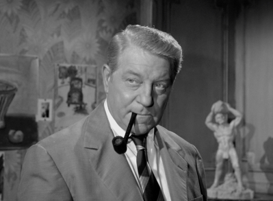 Jean Gabin as Inspector Jules Maigret in MAIGRET SETS A TRAP.