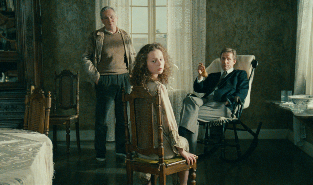 Erland Josephson, Filippa Franzén, and Sven Wollter in Andrei Tarkovsky's THE SACRIFICE.