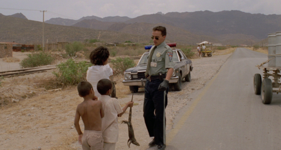 As the HIGHWAY PATROLMAN, Pedro (Roberto Sosa) must deal with all manner of infractions in Alex Cox's drama.