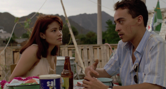 Roberto Sosa as Pedro and Vanessa Bauche as Maribel in Alex Cox's HIGHWAY PATROLMAN.