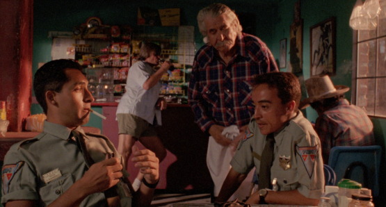 Bruno Bichir as Anibal and Roberto Sosa as Pedro in Alex Cox's HIGHWAY PATROLMAN.