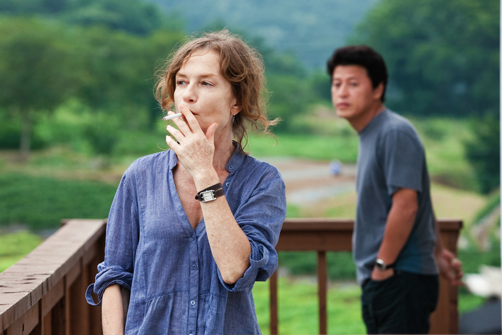 Isabelle Huppert and Yu Junsang in Hong Sang-soo's IN ANOTHER COUNTRY
