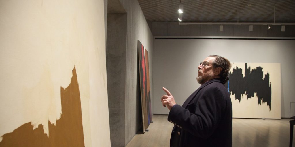Julian Schnabel working at the Clyfford Still Museum in 2017, photo by Justin Wambold