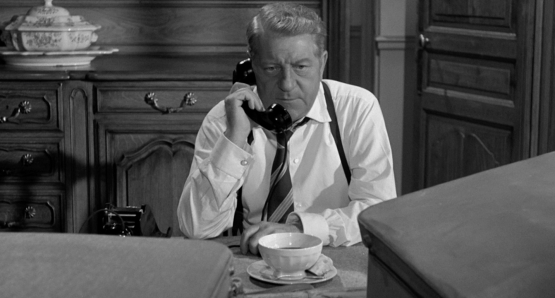 Jean Gabin as Inspector Jules Maigret in MAIGRET SETS A TRAP.