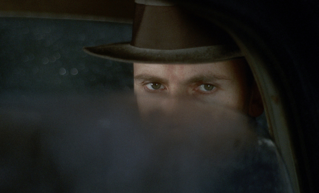 Jean-Louis Trintignant as Marcello Clerici in Bernardo Bertolucci's THE CONFORMIST. The cinematography is by Vittorio Storaro.