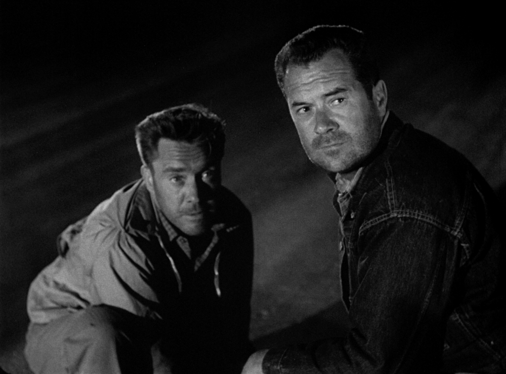 Edmund O'Brien and Frank Lovejoy cannot shake William Talman's THE HITCH-HIKER.
