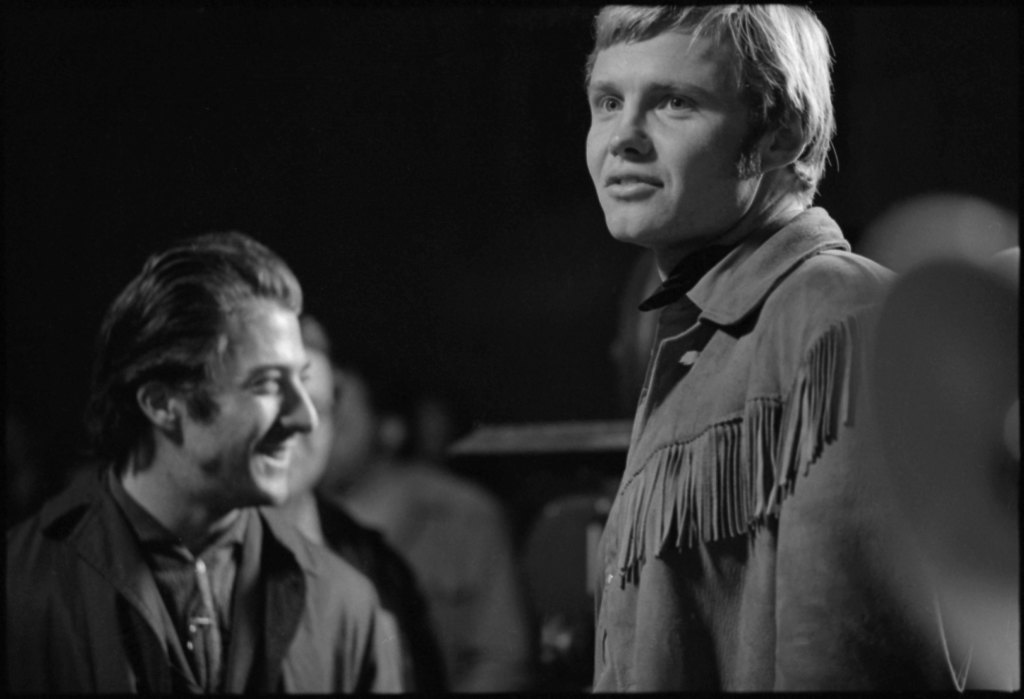 Jon Voight and Dustin Hoffman on the set of MIDNIGHT COWBOY. Photo by Michael Childers.